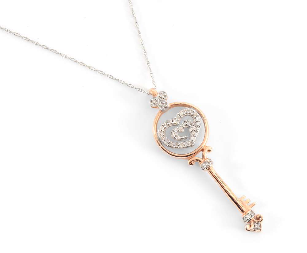 Appraisal: DIAMOND KEY NECKLACE Tiffany inspired K rose gold key shaped