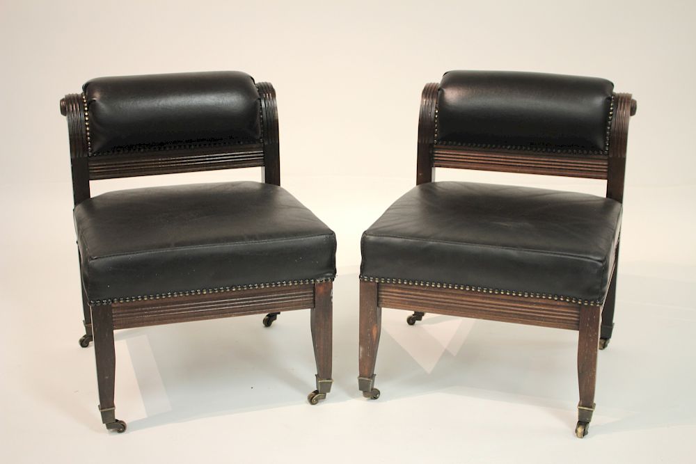 Appraisal: Pr Carved Mahogany and Leather Fireside Chairs Pair of Carved