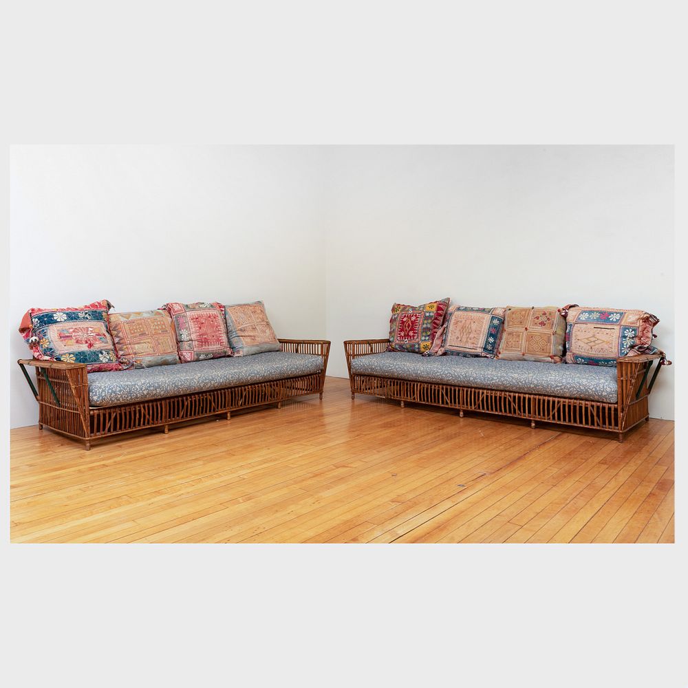 Appraisal: Pair of Large Rattan and Upholstered Sofas Each with green