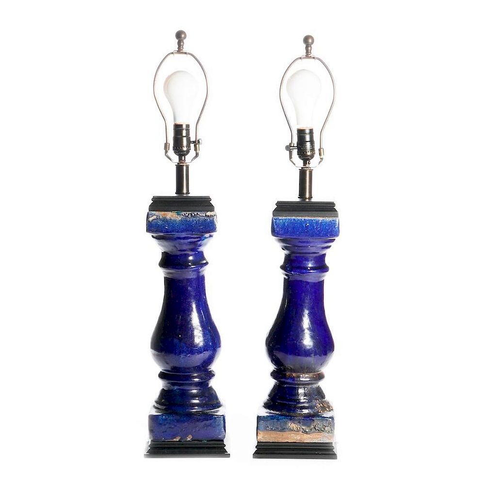 Appraisal: Pair of lapis glazed pottery column lamps A pair of