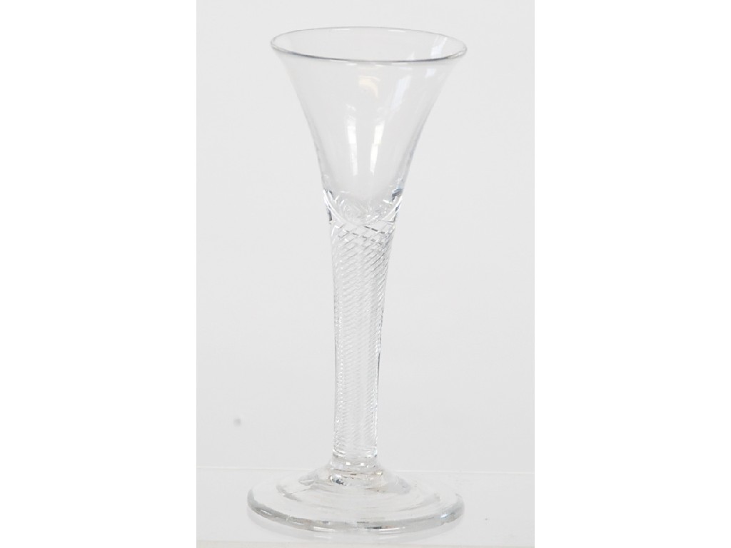 Appraisal: AN ANTIQUE AIR TWIST WINE GLASS the drawn trumpet bowl