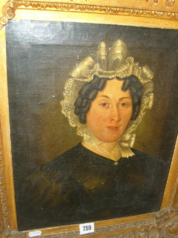 Appraisal: A Victorian oil painting on canvas portrait of a woman