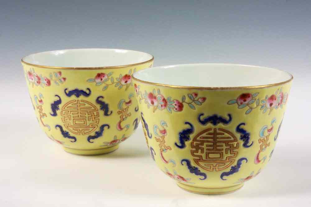 Appraisal: PAIR CHINESE PORCELAIN CUPS - Chinese Yellow Cups decorated with