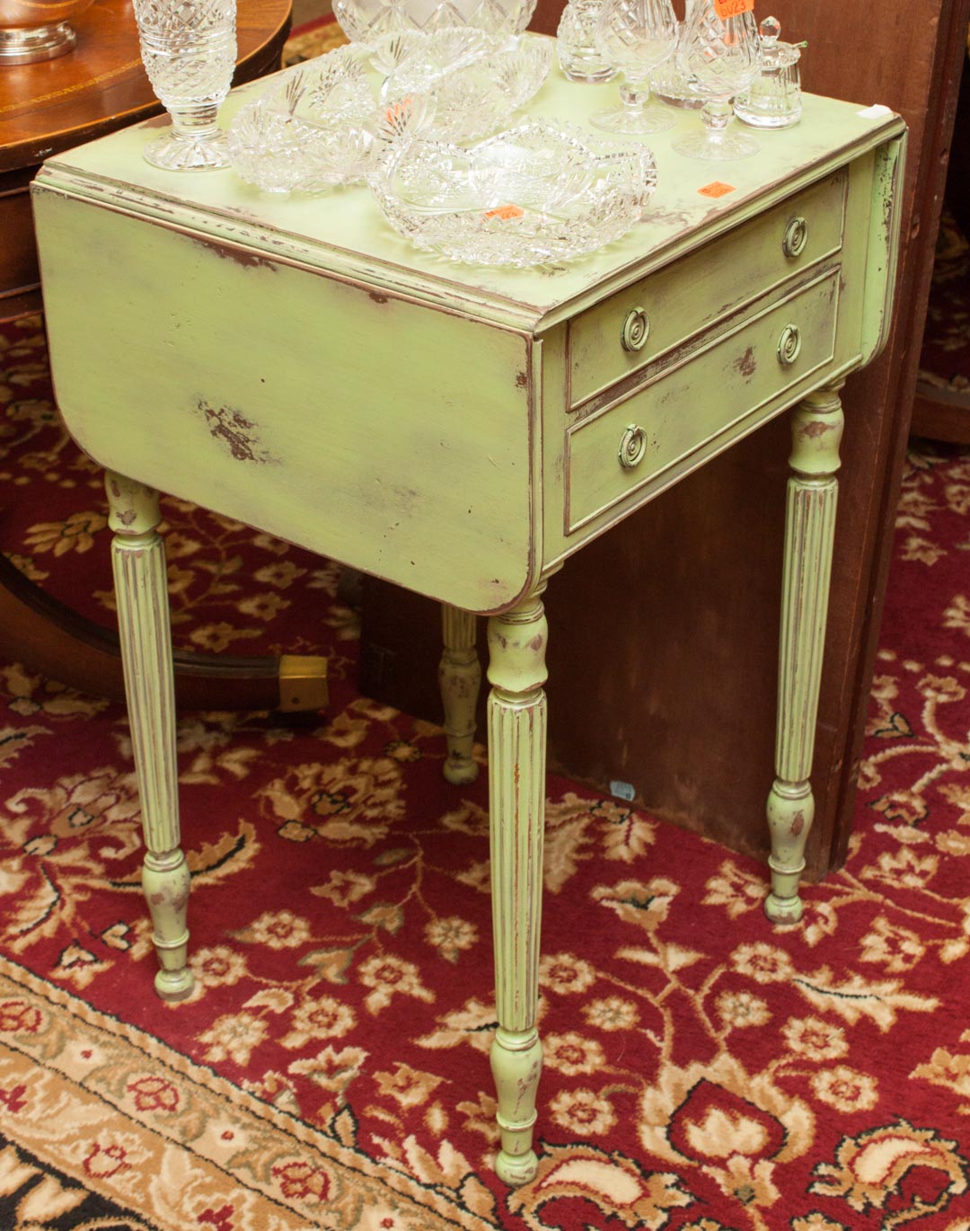 Appraisal: Two-drawer end table decorated with green distressed paint