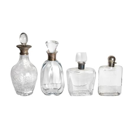 Appraisal: Group of Four Silver Mounted Glass Decanters Estimate -