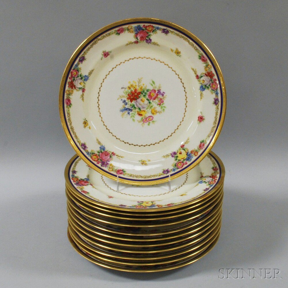 Appraisal: Set of Twelve French Porcelain Floral-decorated Dinner Plates Paris France