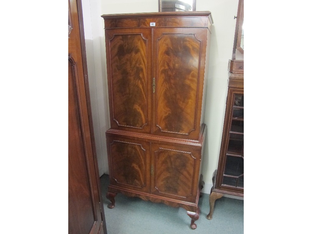 Appraisal: Reproduction two door cabinet on chest