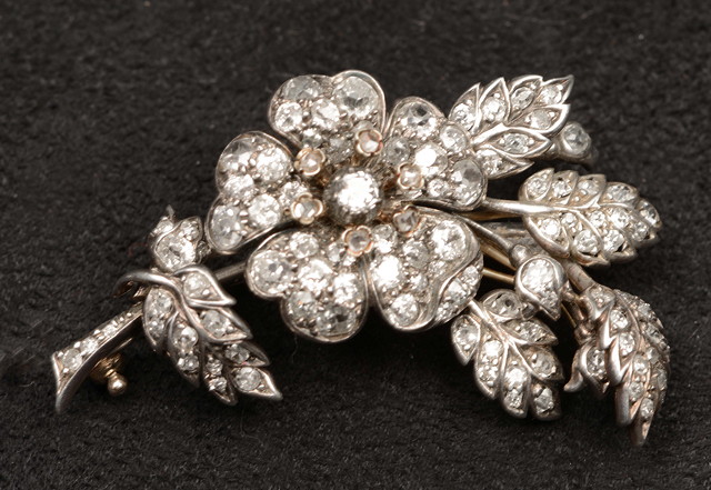 Appraisal: A VICTORIAN DIAMOND SET FLORAL TREMBLEUSE BROOCH in the form