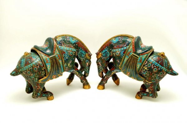 Appraisal: A pair of large mirror image cloisonne horse figures Gilt