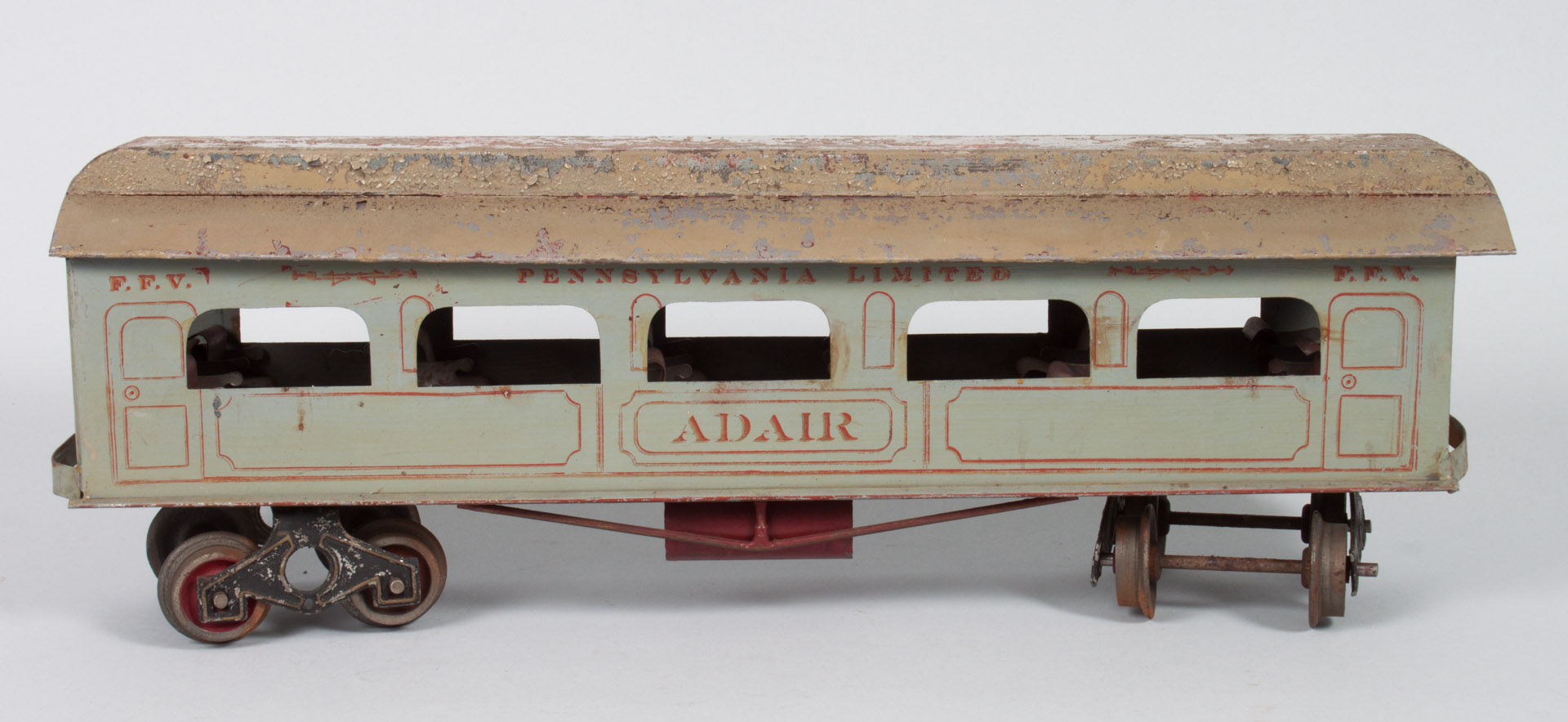 Appraisal: American tin plate passenger car before probably Carlisle Finch grey