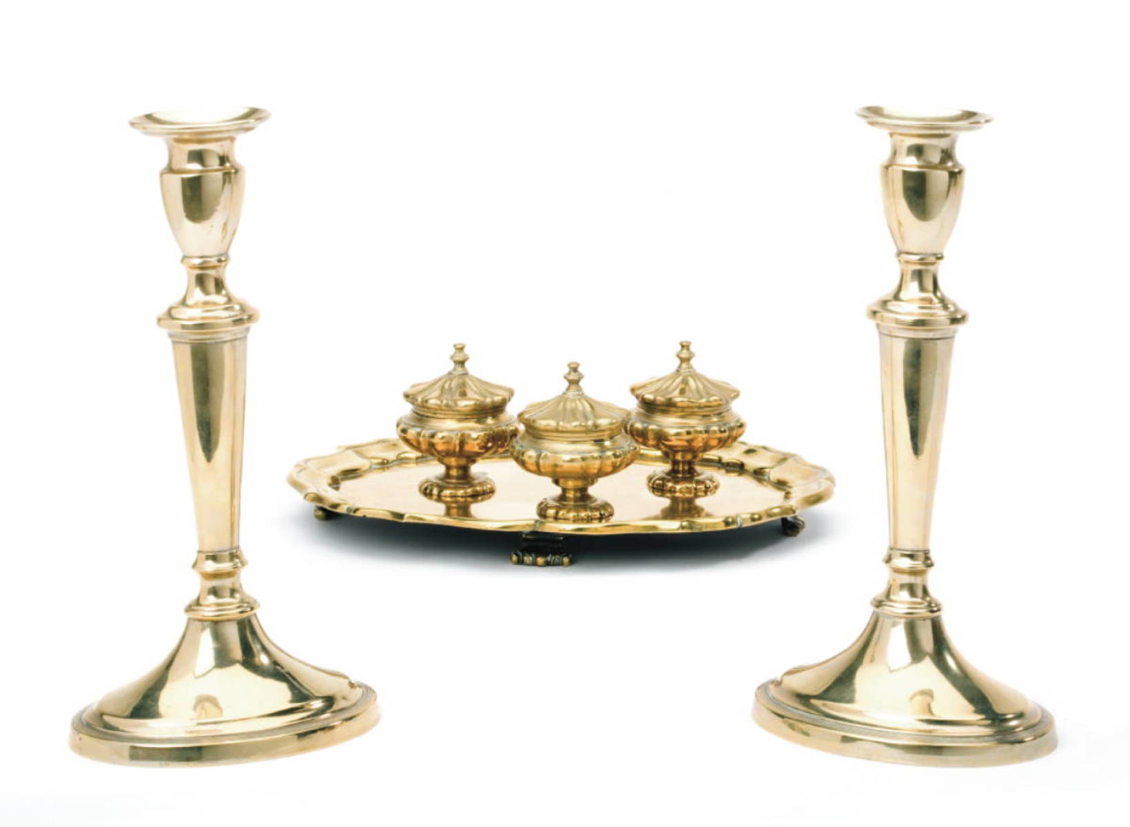 Appraisal: CONTINENTAL BRASS STANDISH AND A PAIR OF BRASS CANDLESTICKS The