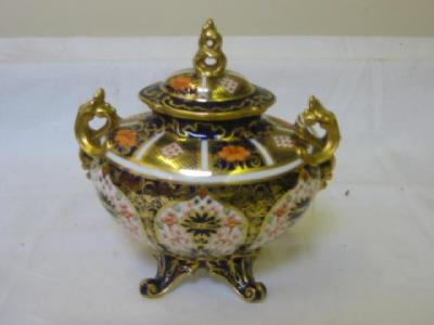 Appraisal: A ROYAL CROWN DERBY PORCELAIN LIDDED URN of oval form