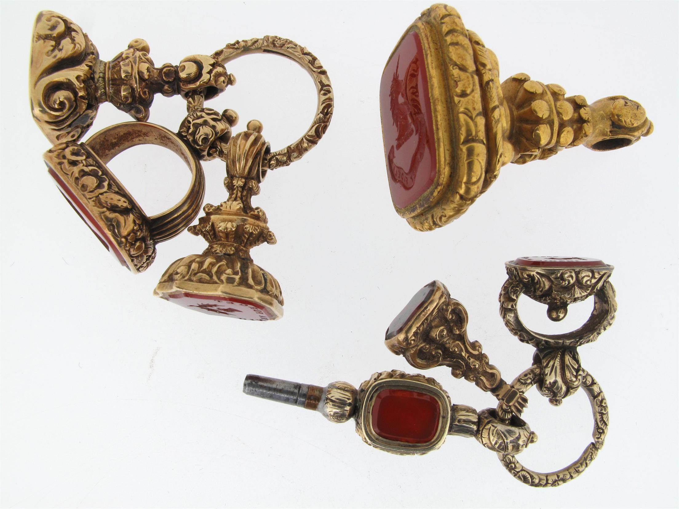 Appraisal: A watch key pendant mounted with two hardstones