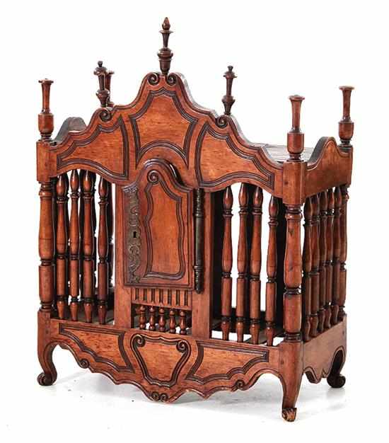 Appraisal: French Provincial carved mahogany panetiere th century turned finials upon