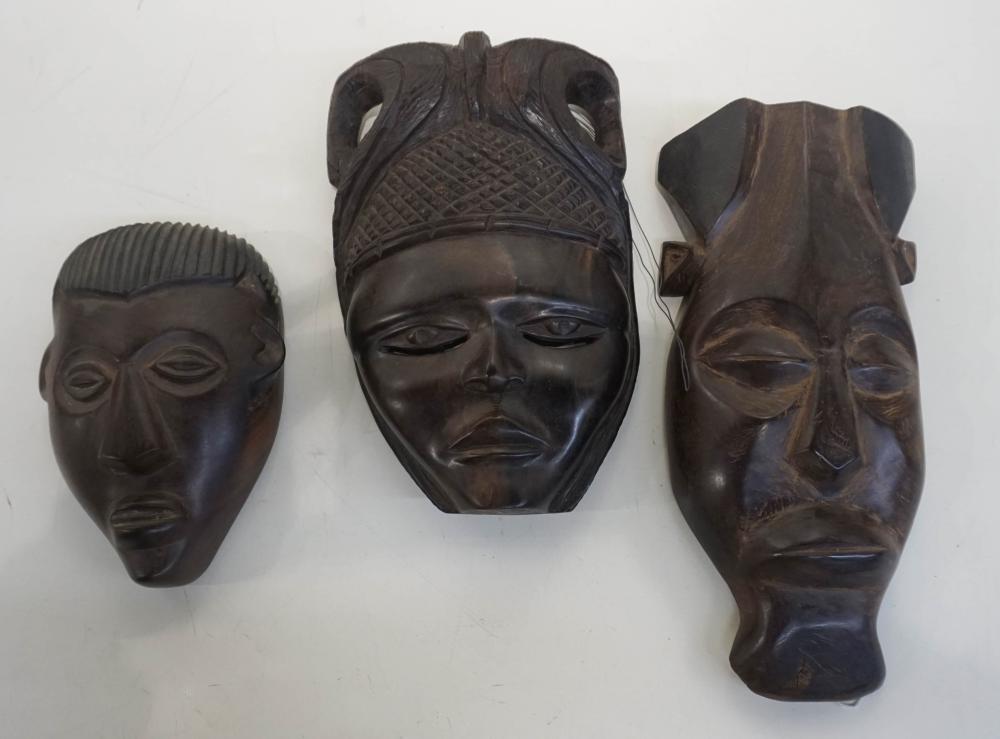 Appraisal: THREE AFRICAN CARVED WOOD MASKSThree African Carved Wood Masks From