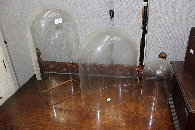 Appraisal: THREE OLD GLASS DOMES the largest cm in height