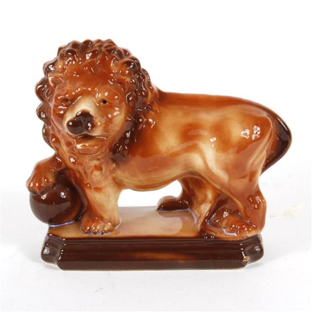 Appraisal: STAFFORDSHIRE CERAMIC LION WITH BALL FIGURE Staffordshire ceramic lion with