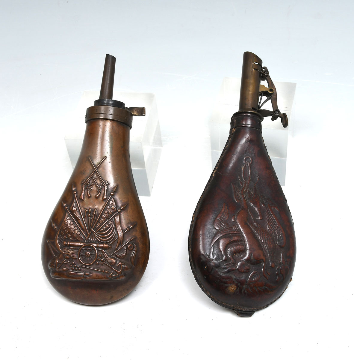 Appraisal: PC CIVIL WAR ERA POWDER FLASKS Comprising - Embossed leather