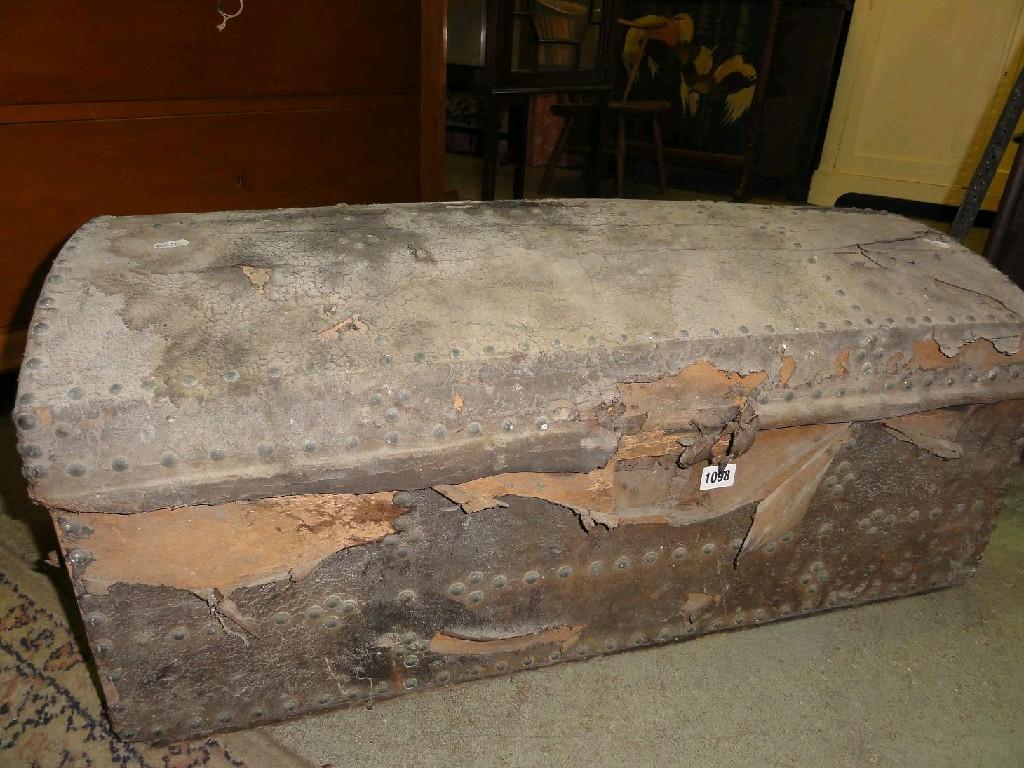 Appraisal: An antique domed top trunk chest leather bound with stud