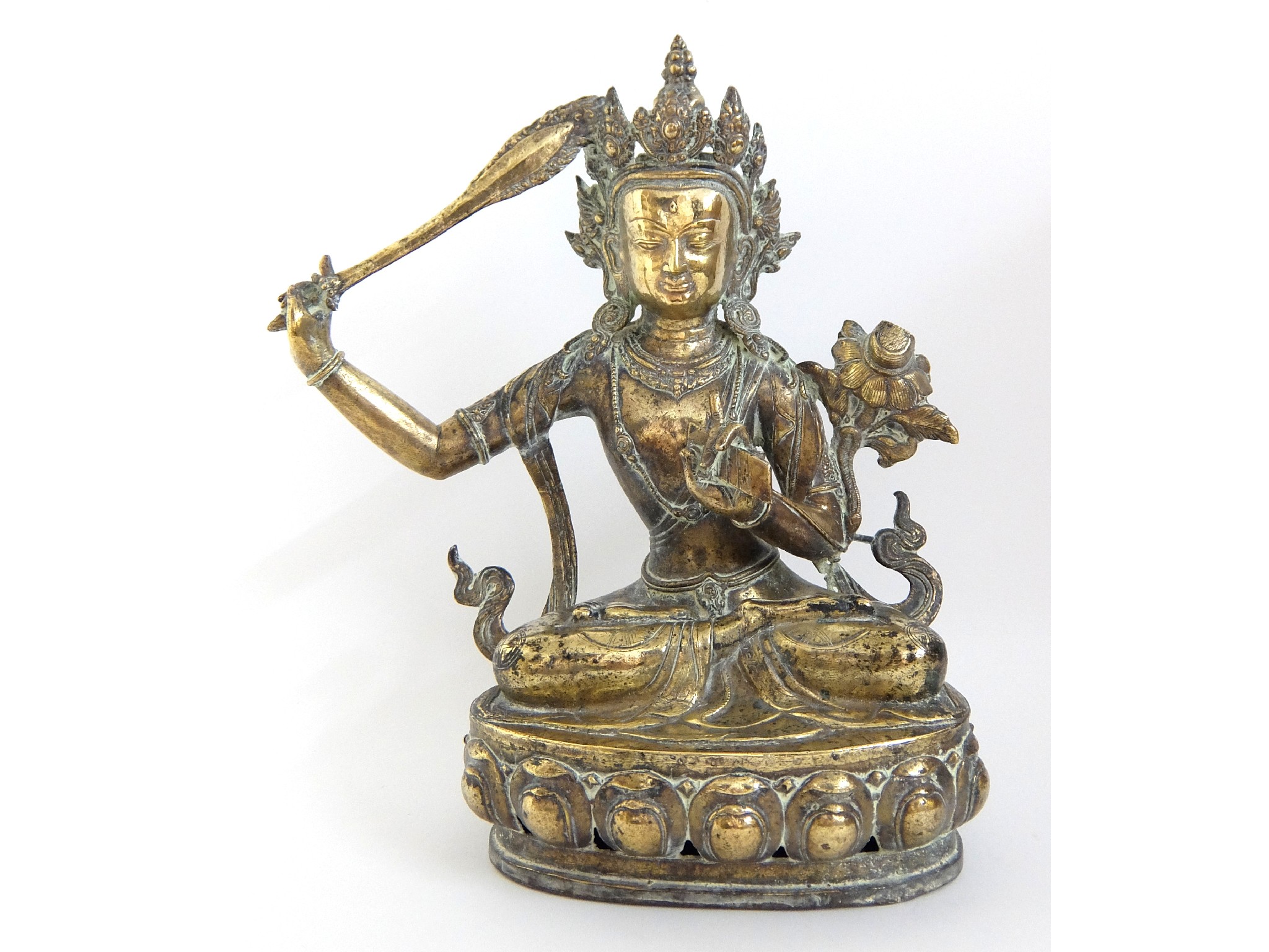 Appraisal: A Sino-Tibetan brass figure of Taraseated in lotus position holding