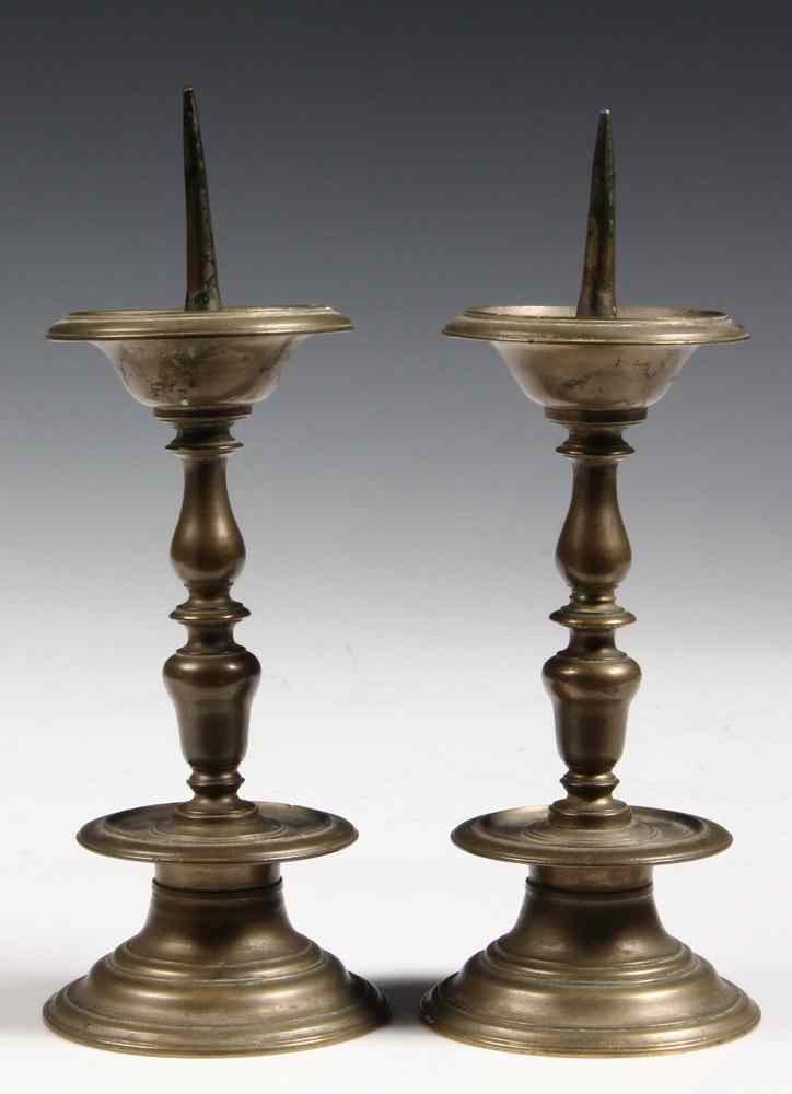 Appraisal: PAIR OF CANDLESTICKS- probably German brass th Century The drip-pan