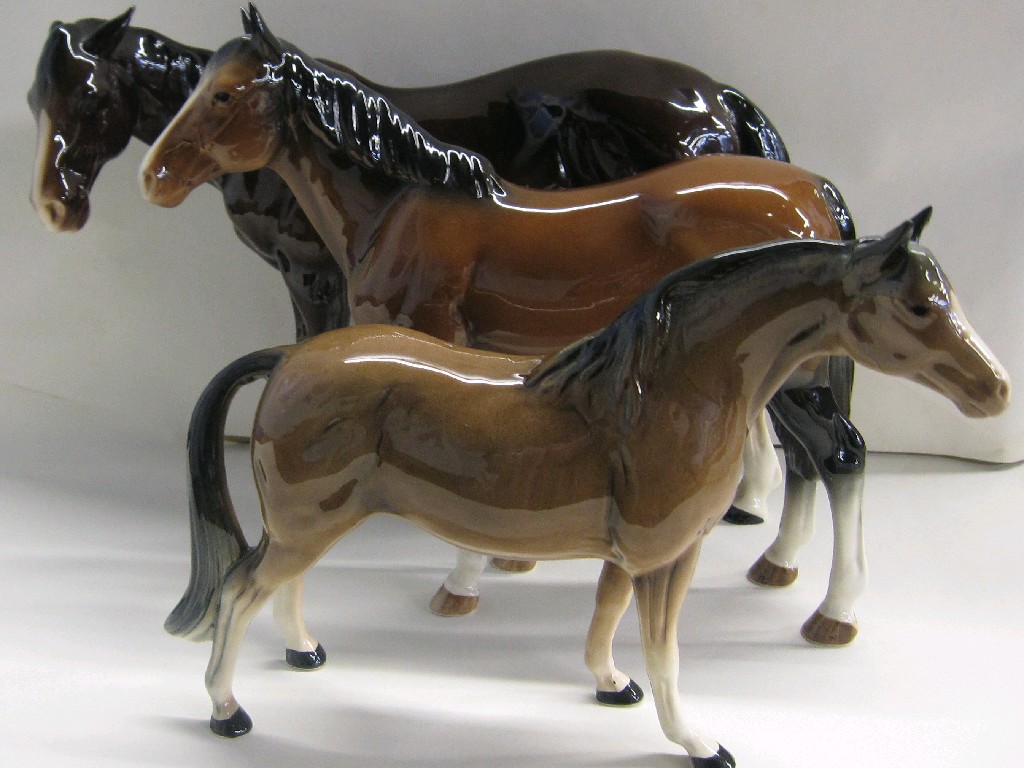 Appraisal: Two large Melba ware horses and another similar