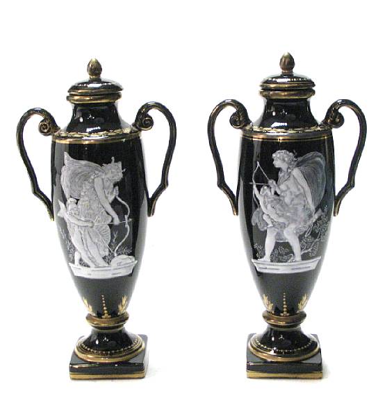 Appraisal: A pair of French pate-sur-pate style porcelain vases height in