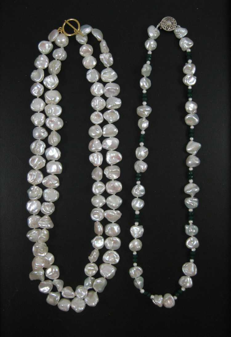 Appraisal: TWO PRINCESS LENGTH WHITE PEARL NECKLACES including a - inch