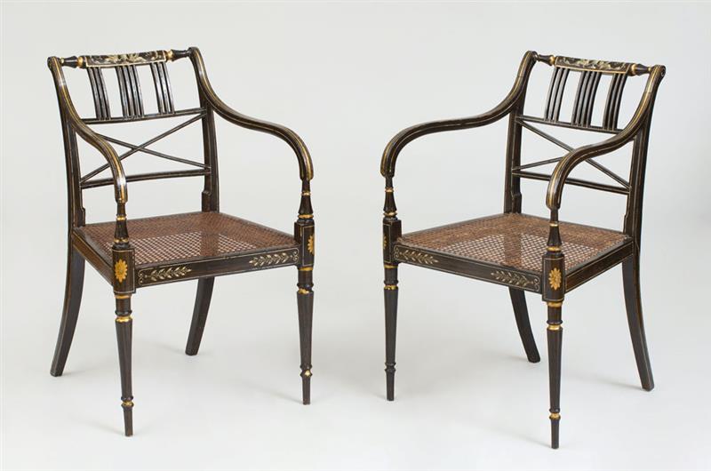 Appraisal: PAIR OF REGENCY FAUX GRAIN PAINTED PARCEL-GILT AND CANED ARMCHAIRS