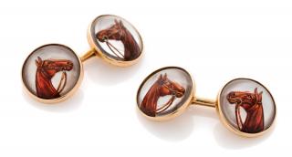 Appraisal: A Pair of Yellow Gold and Reverse Crystal Horse Cufflinks