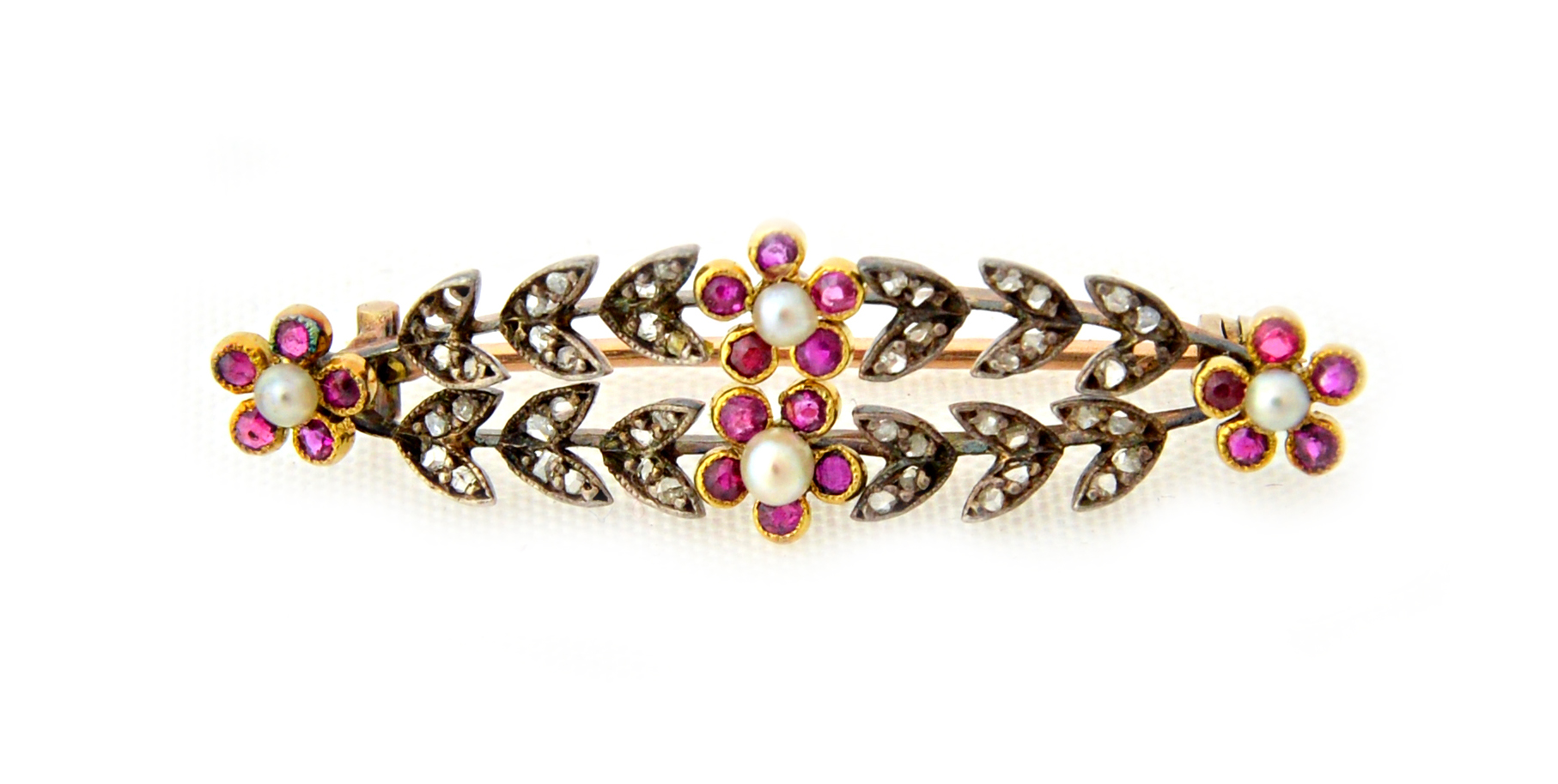 Appraisal: A gold backed rose diamond ruby and cultured pearl brooch