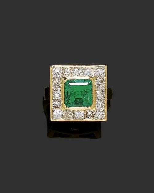 Appraisal: EMERALD AND DIAMOND RING Yellow gold Elegant ring the square