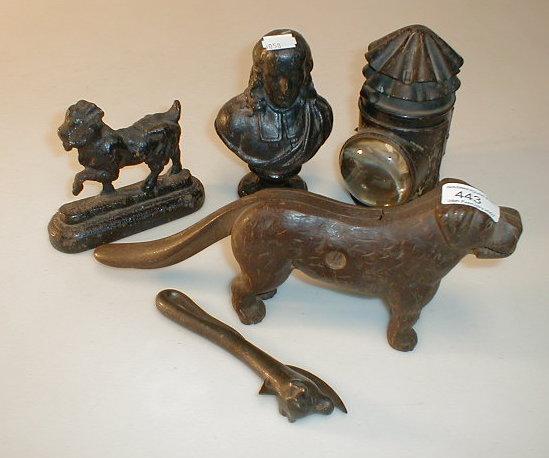 Appraisal: Metalware cast dog doorstop and nut cracker bust tin opener