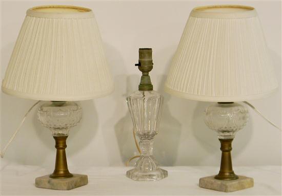 Appraisal: Three th C fluid glass lamps a pair of colorless