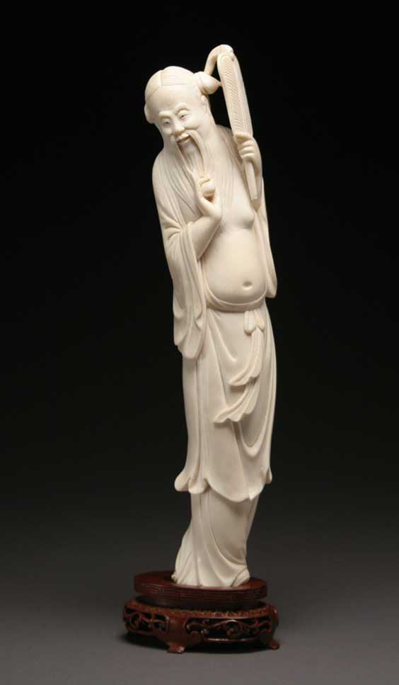 Appraisal: CARVED IVORY IMMORTAL Tall and well carved Chinese ivory figure