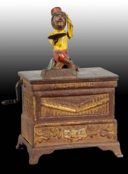 Appraisal: Cast Iron Monkey Organ Grinder Mechanical Bank Description Manufactured by