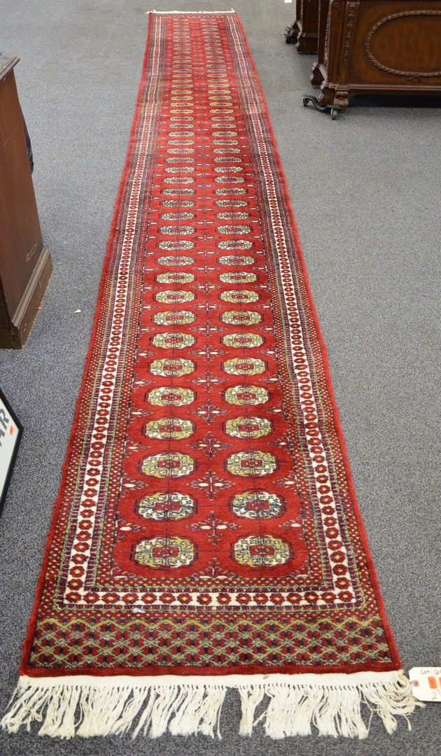 Appraisal: x Red Bokhara carpet runner