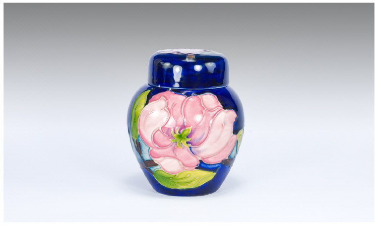 Appraisal: Moorcroft Pottery Magnolia Pattern Ginger Jar And Cover Decorated In