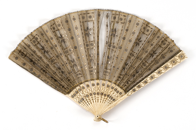 Appraisal: NET AND BONE FOLDING FAN Late th CenturyGold and silver