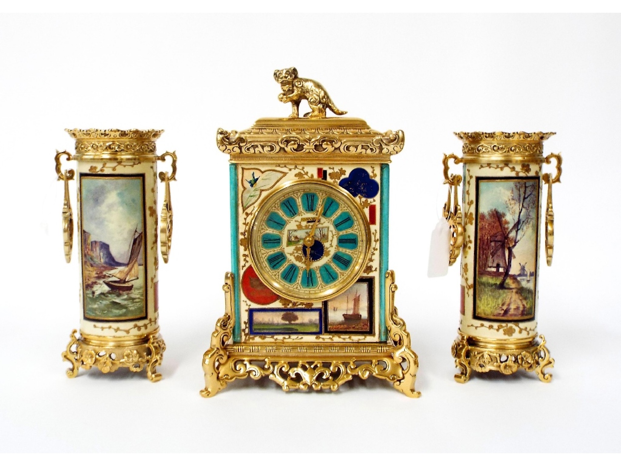 Appraisal: Attractive ormolu and porcelain mantel timepiece garniture the movement with