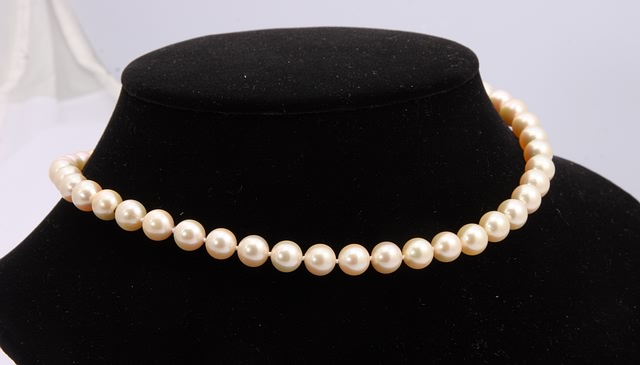 Appraisal: long Invisible clasp - mm pearls gms Ship plus insurance