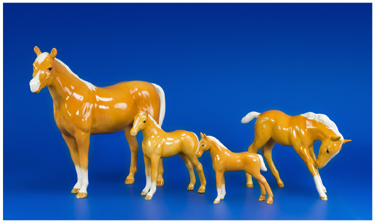 Appraisal: Beswick Animal Figures Four all Palomino Gloss Horses comprising Arab