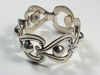 Appraisal: BRACELET - Mexican silver link bracelet composed of heart and