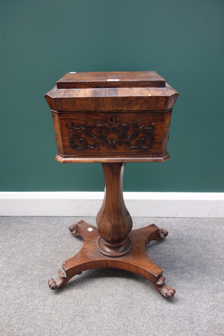 Appraisal: An early th century rosewood teapoy with four lidded interior