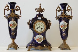 Appraisal: CERAMIC AND GILT METAL CLOCK GARNITURE