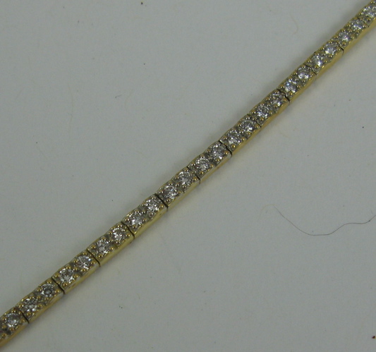 Appraisal: DIAMOND AND K GOLD BRACELET in length and set with