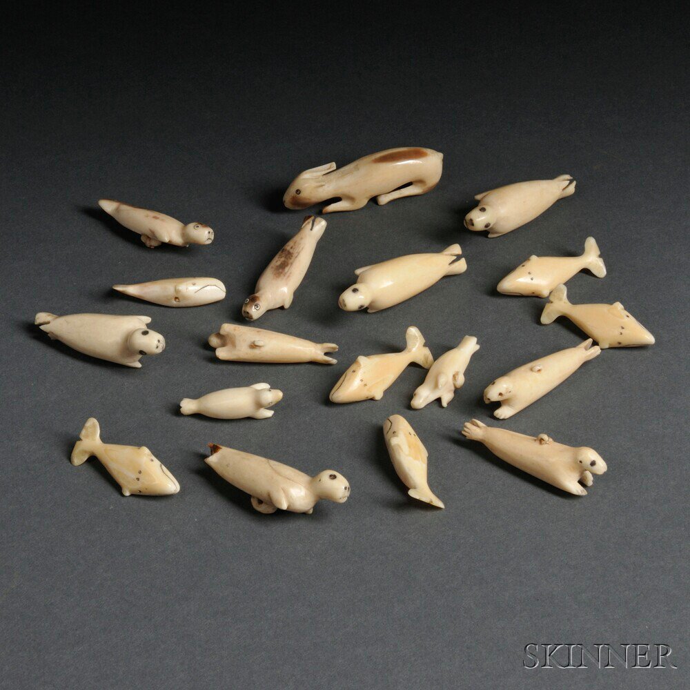 Appraisal: Collection of Eskimo Carved Ivory Pendants or Buttons c includes