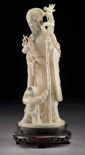 Appraisal: Chinese carved ivory figure group International buyers should note that