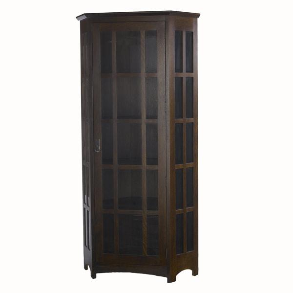 Appraisal: STICKLEY E J AUDI Reproduction trapezoidal corner cupboard with D-pulls