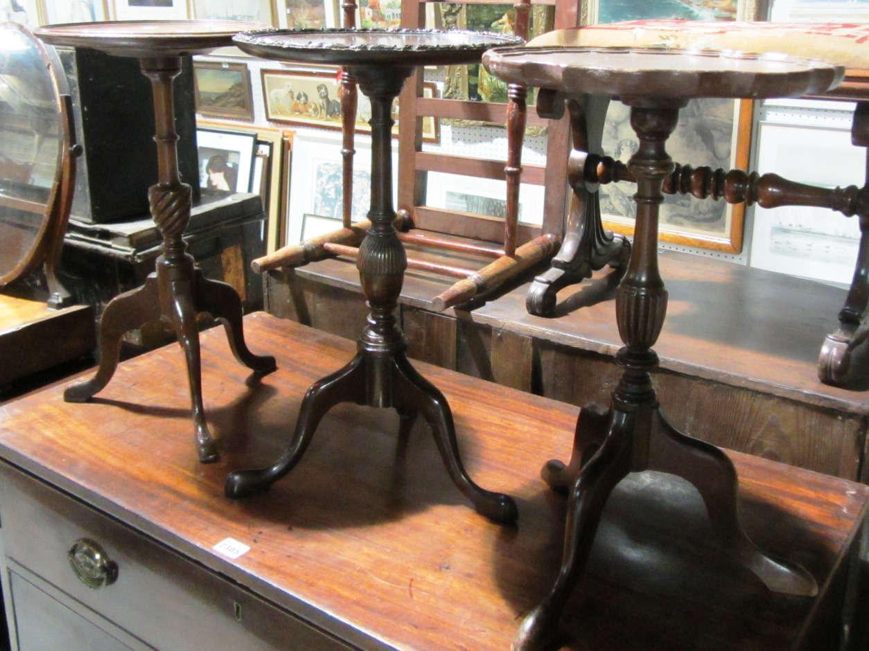 Appraisal: A group of three th century mahogany wine tables